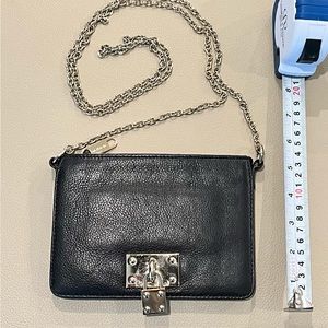 Gently used black leather crossbody with beautiful detail